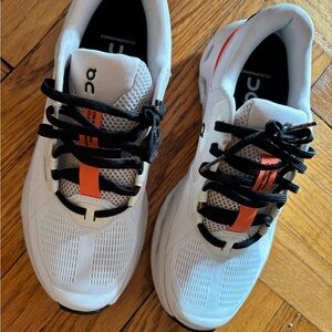 On Running Cloudrunner White Sneakers with Orange Highlights